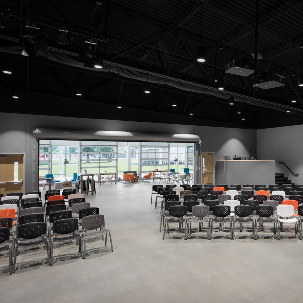 church designer visioneering studios designed a worship center for students to gather