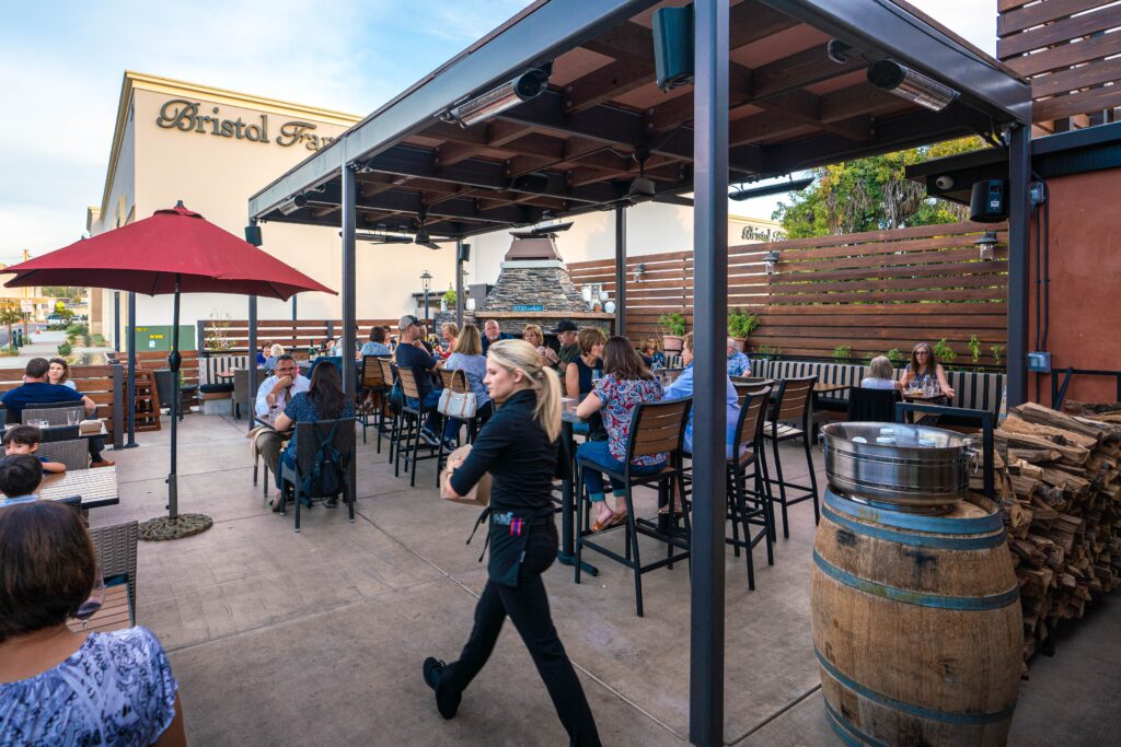 restaurants building design - exterior patio of terra wood-fired kitchen designed by visioneering studios