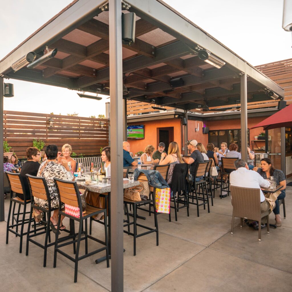 guest enjoying the restaurants architecture design on the patio